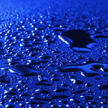 water drops on a metal surface showing freshness concept