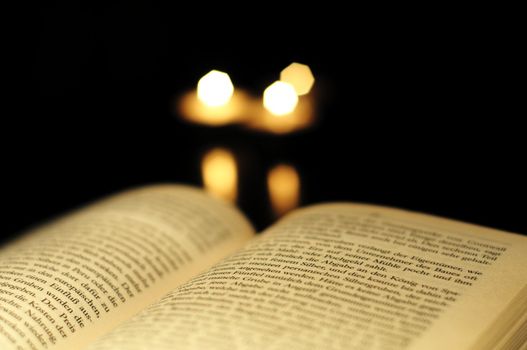 reading a book and copyspace on black