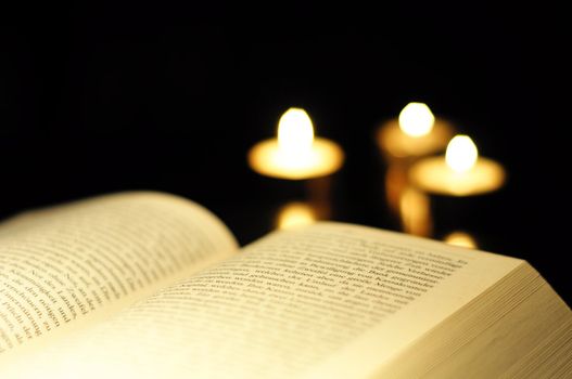 reading a book and copyspace on black