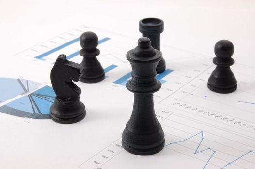 chess man over business chart admonish to strategic behavior