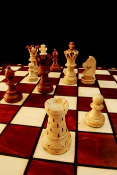 chess pieces on chess board showing competition success and strategy in business