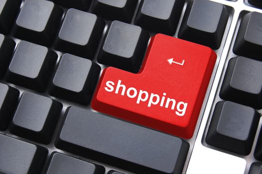 shopping concept with computer enter key on keyboard