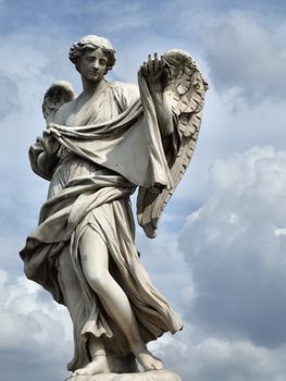 Angellic figure. Classic sculpture in Rome, Italy.