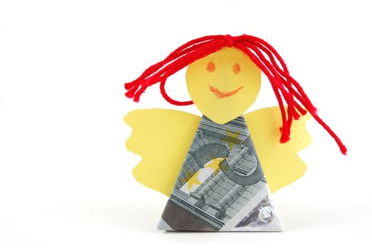 Angel made of money isolated on white background