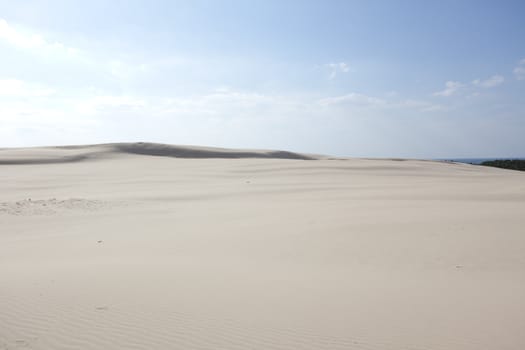 Waves of sand - formed by wind and water