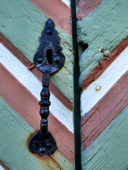 Decorative door handle in a Norwegian house.