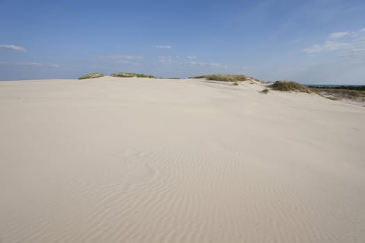 Waves of sand - formed by wind and water