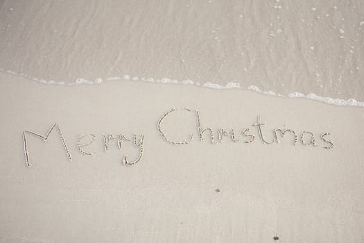 Text written in the beach