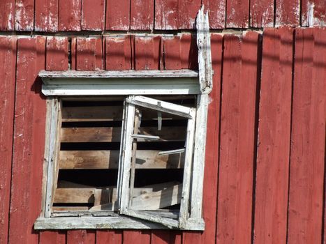 Old building falling apart. Wooden construction.