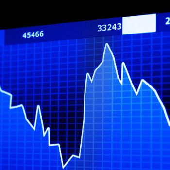 stock market data on computer monitor showing success