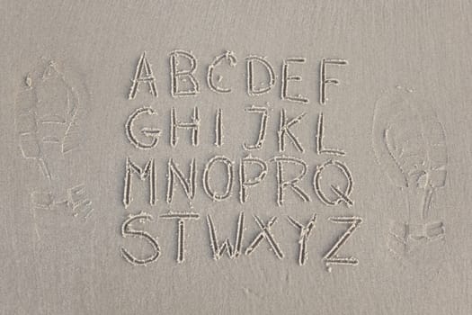 Alphabet on sand