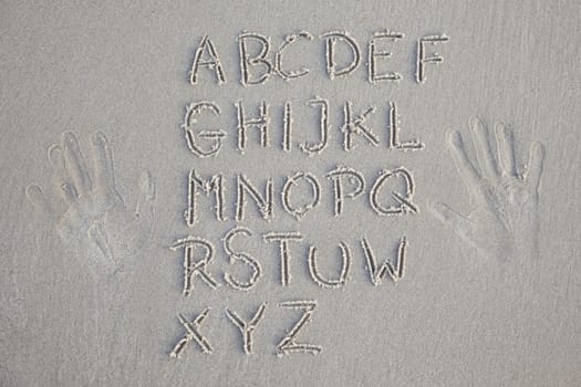 Text written in the beach