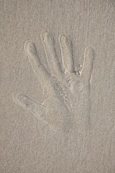 Text written in the beach