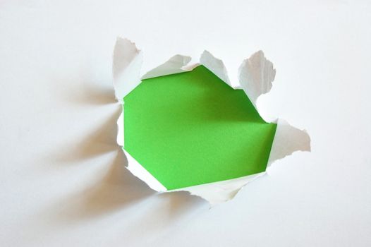green hole with copyspace in empty sheet paper