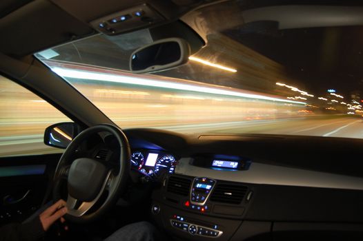 speed car at night in motion with traffic