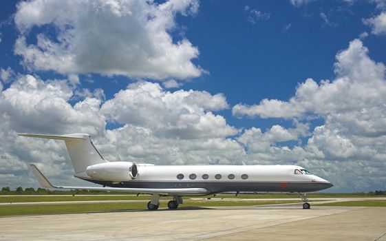 Luxury business jet parked at exotic airport