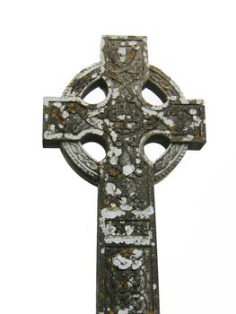 Moss covered antique Celtic cross at an Irish cemetery. 