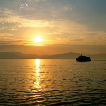 Sun rising over the greek island of Corfu greece