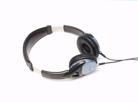 Headphones with blue earpieces on an isolated white background.