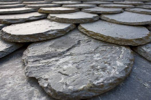 Traditional grey schist tile roofing, nice background. 