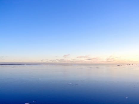 Tranquil water skyline with the blue sky 