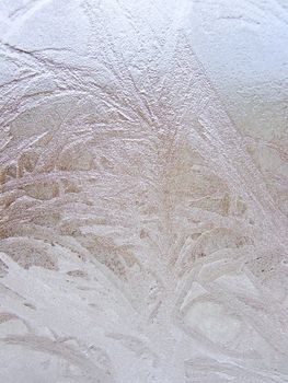 Winter frost window with the ornate crystals