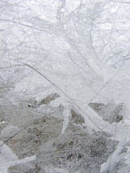 Winter frost window with the ornate crystals