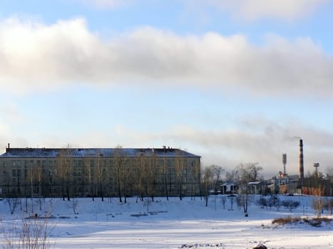 Winter view of the industrial town buildings 
