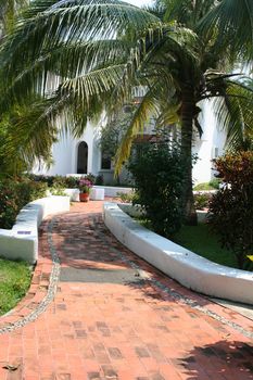 Walkway entrance to luxury tropical home
