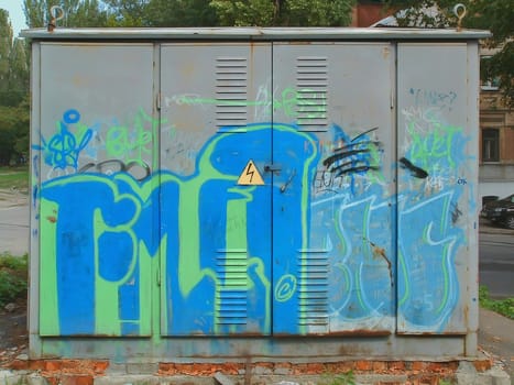 The image of old electric substation the ornamented youth in style "graffiti"