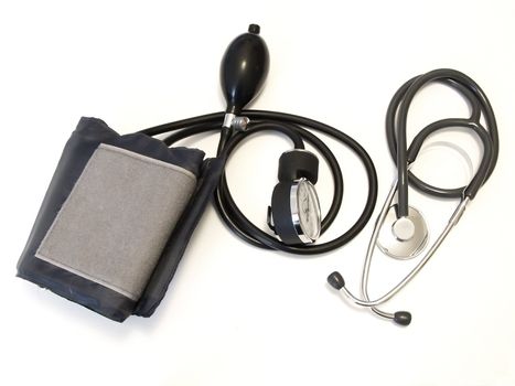 The medical manometer with stethoscope against white background