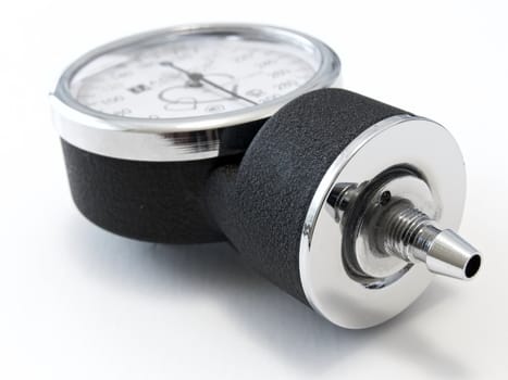 Close up medical manometer against the white background