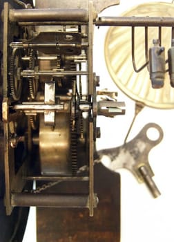 mechanism of the old broken wall clock