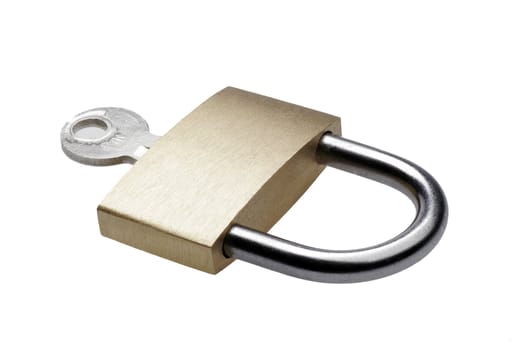 Closed Brass Padlock With Small Ket On A White Background