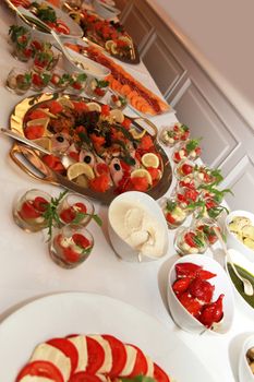 buffet with fish and tomato