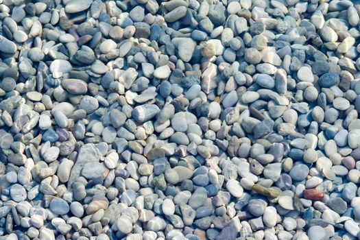 Pebbles background under water surface