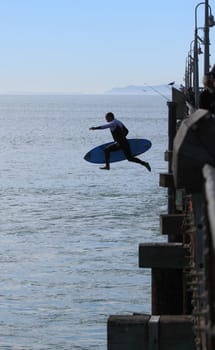 VENTURA, CA, USA - January 10, 2010 - Surfer having fun throughout a high surf event January 10, 2010 in Ventura, CA