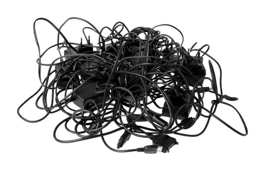 Tangled cables and connectors illustrating complex problems and obstacles.