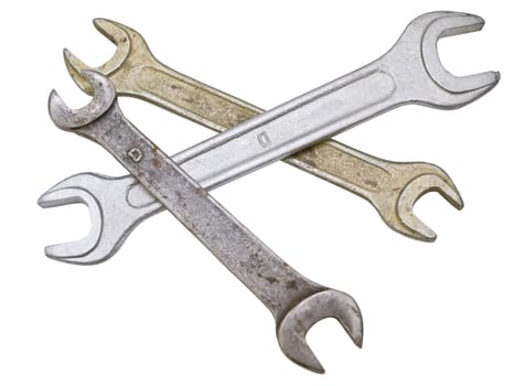 Three isolated metal spanners against white background 
