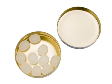 Isolated boiled sweets in metal box against the white background