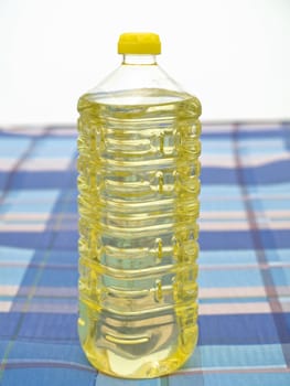 Food golden oil in the single clear bottle