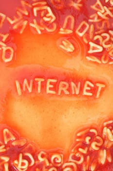 internet web or www concept with red pasta food