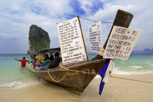Longtailboat tied up at the beach, Koh Poda, in Thailand