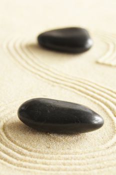 zen garden with sand stones and copyspace for a text message