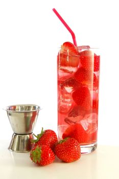 red strawberry cocktail drink in long glass