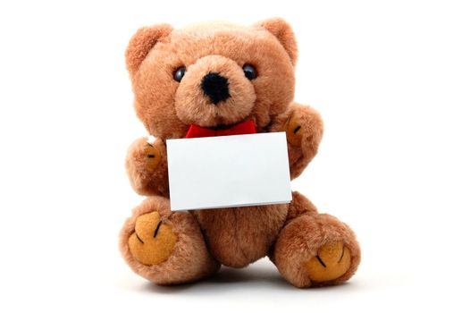 toy teddy bear with blank sheet isolated on white background