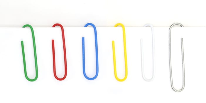 A variety of paperclips shot against a white background.