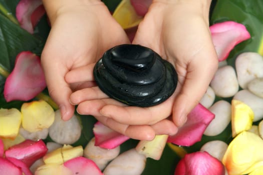 Hot stone manicure.  Relax while your fingers & hands are soaked in warm herbal water, then smooth warm basalt stones are used for a luxurious hand massage relaxing your often neglected and overworked hands. Finish with buff and polish.