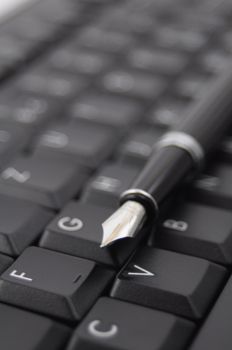 pan and black computer keyboard showing communication concept