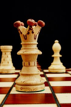 chess pieces showing power competition conflict and strategy in business